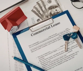 Commercial lease UK agreement being reviewed by landlord and business tenant before signing