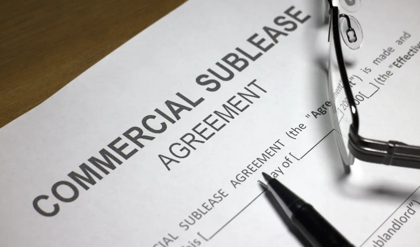 Subletting a commercial lease – landlord and tenant discussing sublease agreement with solicitor